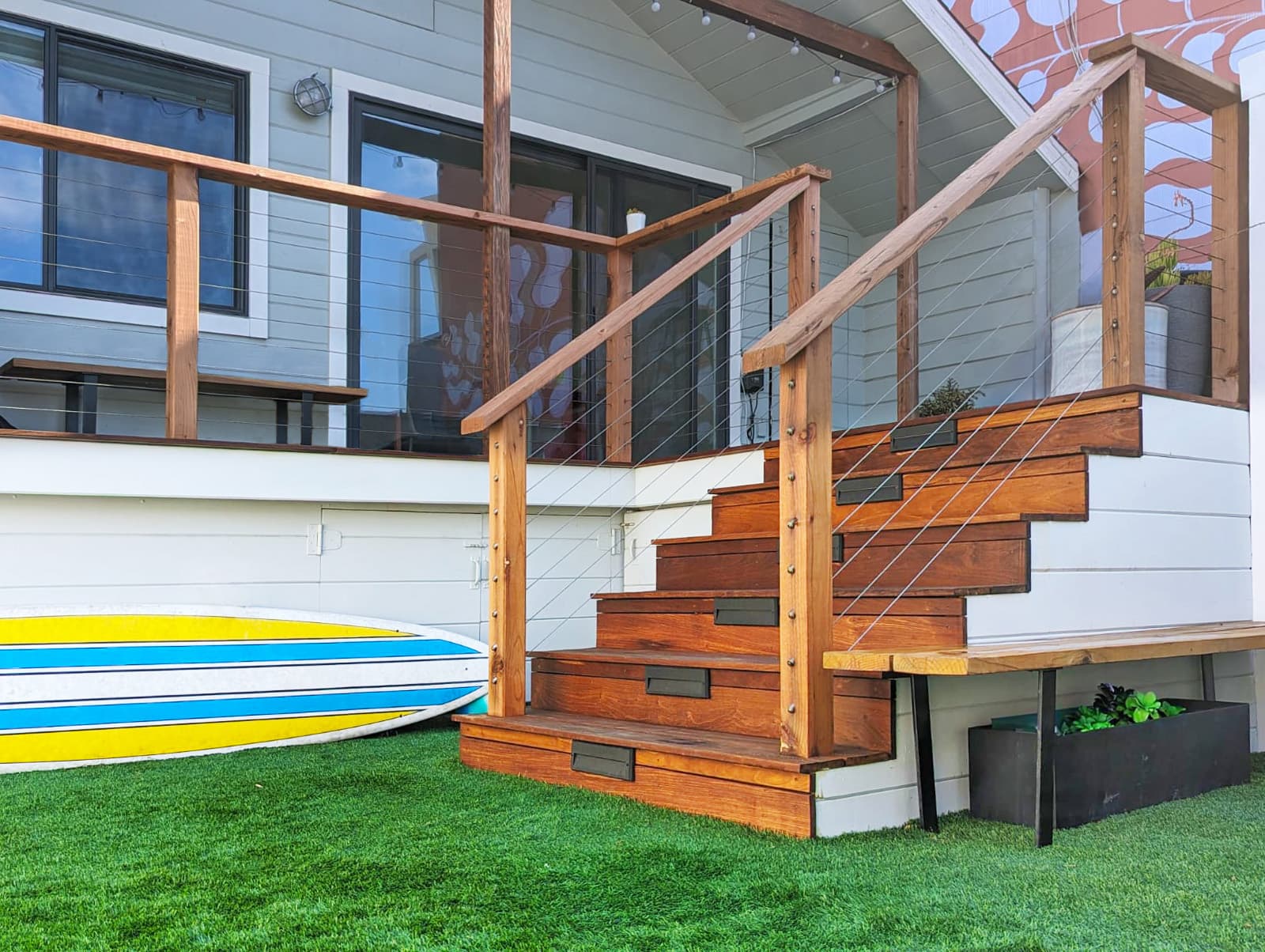 Ipê deck, cable railing, artificial turf