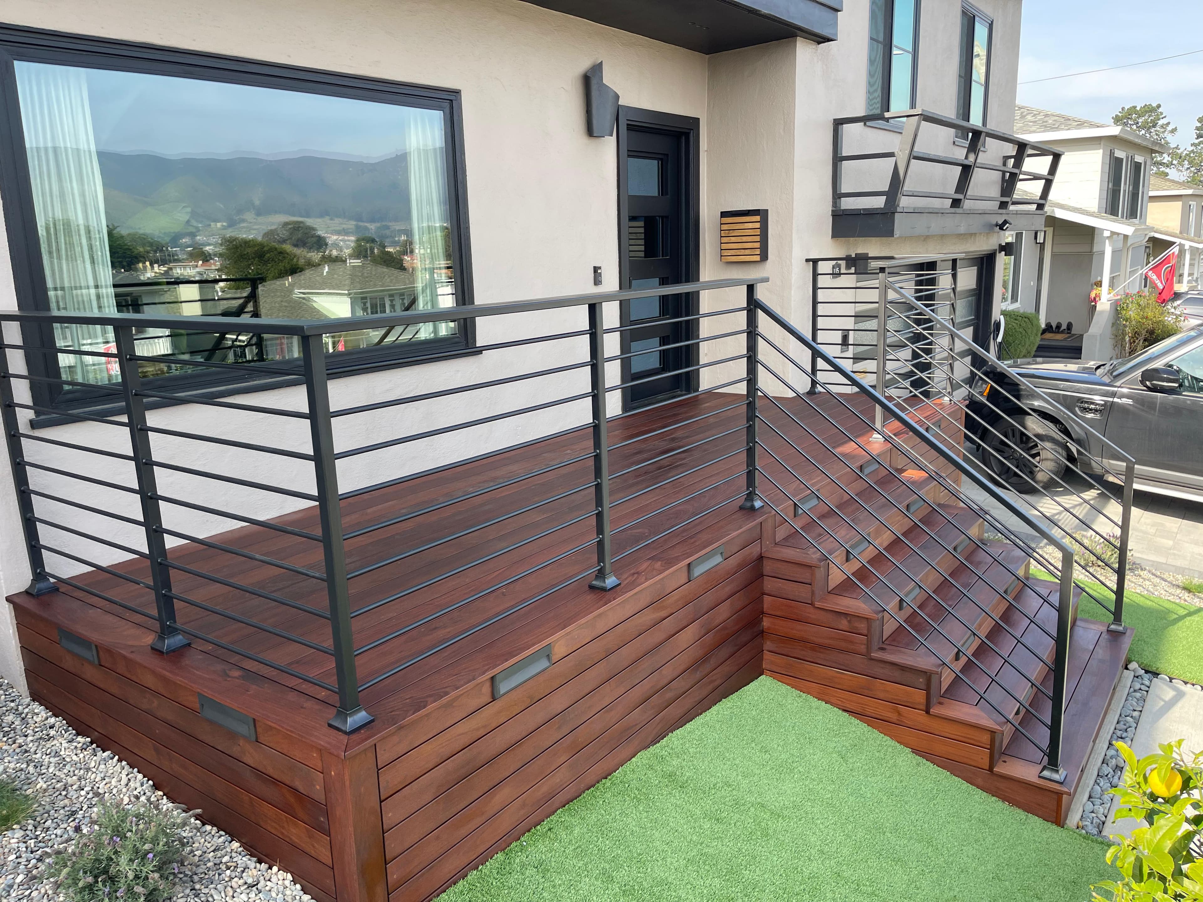 artificial turf, step lights, ipê deck, railing